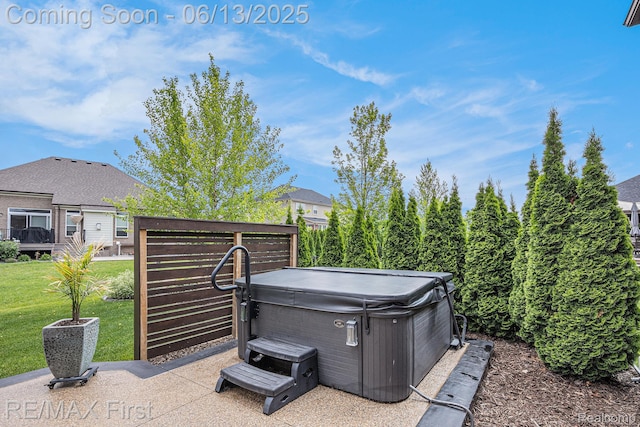 17769 Tiger Dr, Macomb, MI 48042 - view of patio / terrace with a hot tub