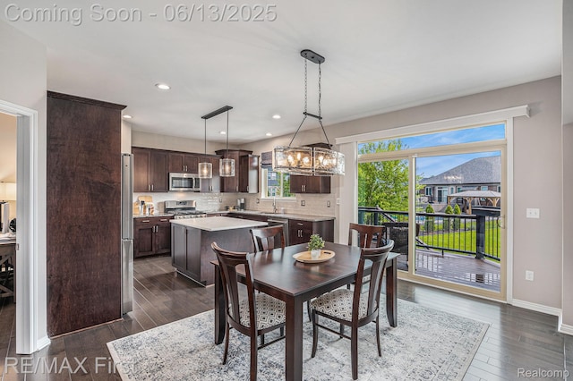 17769 Tiger Dr, Macomb, MI 48042 - dining area with a chandelier, dark wood finished floors, and recessed lighting
