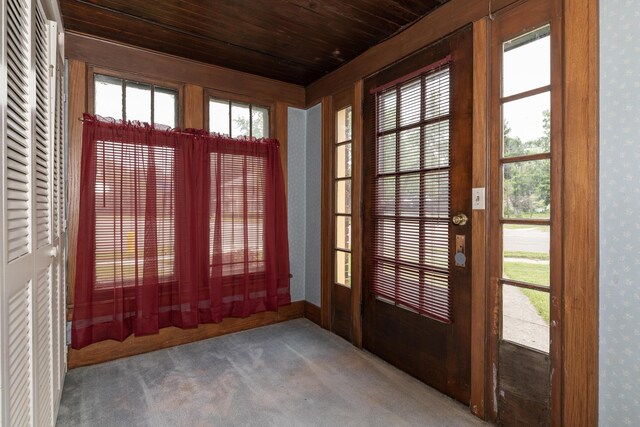3804 Portage St, Kalamazoo, MI 49001 - doorway to outside featuring wooden ceiling, french doors, wallpapered walls, carpet, and healthy amount of natural light