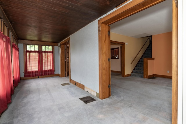 3804 Portage St, Kalamazoo, MI 49001 - spare room with stairs, carpet floors, and wooden ceiling