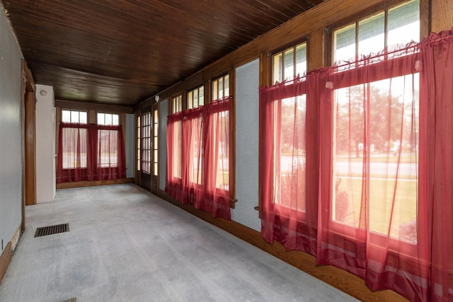 3804 Portage St, Kalamazoo, MI 49001 - unfurnished sunroom featuring plenty of natural light, carpet floors, and wooden ceiling