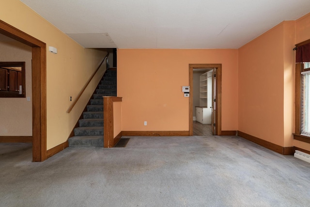 3804 Portage St, Kalamazoo, MI 49001 - unfurnished living room featuring carpet flooring and stairway