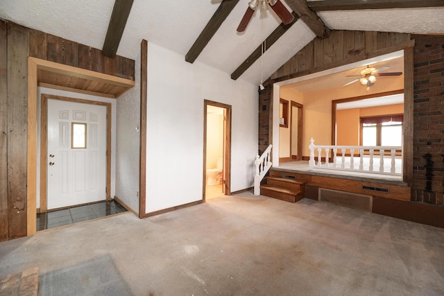 3804 Portage St, Kalamazoo, MI 49001 - unfurnished living room featuring a ceiling fan, carpet, and a textured ceiling