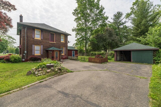 3804 Portage St, Kalamazoo, MI 49001 - view of front of property with a chimney and brick siding