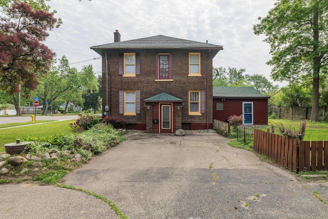 3804 Portage St, Kalamazoo, MI 49001 - view of front of property with a chimney and brick siding