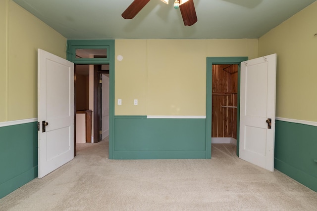 3804 Portage St, Kalamazoo, MI 49001 - unfurnished bedroom with carpet floors and a ceiling fan