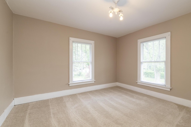 3804 Portage St, Kalamazoo, MI 49001 - spare room featuring light carpet and baseboards