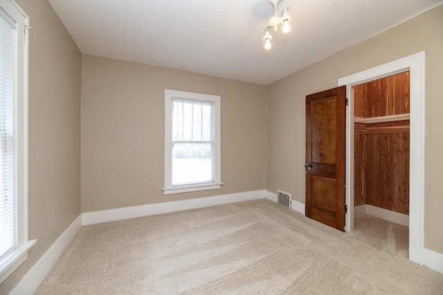 3804 Portage St, Kalamazoo, MI 49001 - unfurnished bedroom featuring carpet floors and a closet