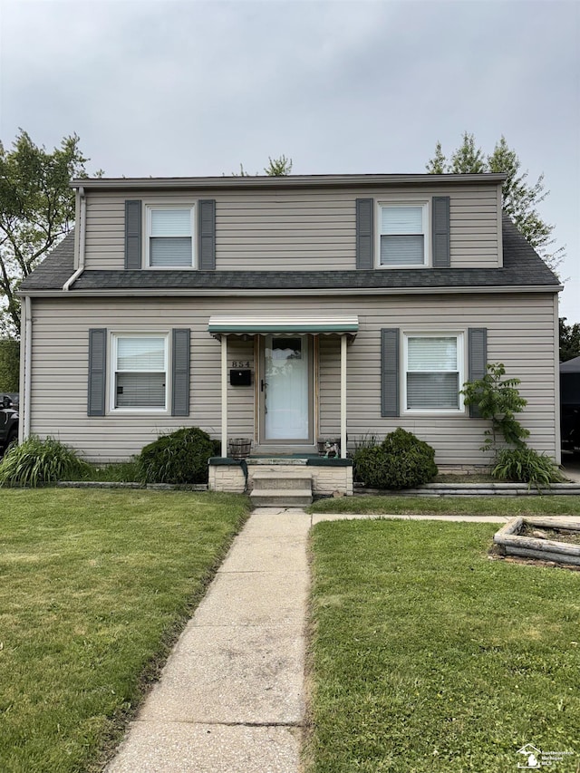 854 Woodville Ave, Monroe, MI 48161 - view of front of property featuring a front yard