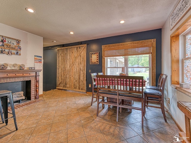 9601 Exeter Rd, Carleton, MI 48117 - dining room featuring a textured ceiling, recessed lighting, and baseboards