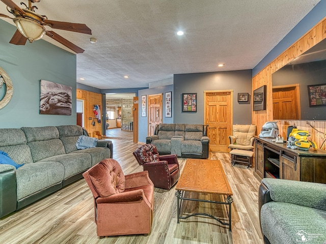 9601 Exeter Rd, Carleton, MI 48117 - living area with a textured ceiling, wood finished floors, a ceiling fan, and recessed lighting