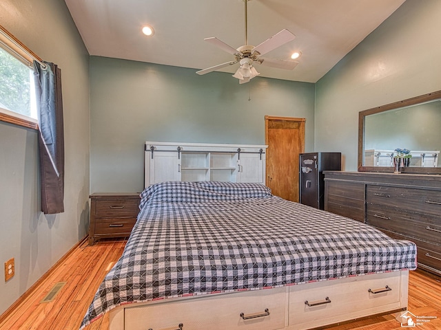 9601 Exeter Rd, Carleton, MI 48117 - bedroom with light wood-type flooring, vaulted ceiling, recessed lighting, and ceiling fan