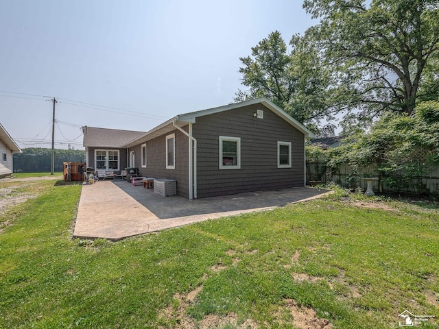 9601 Exeter Rd, Carleton, MI 48117 - back of house with a patio area