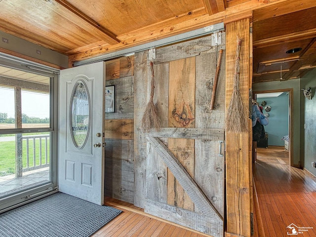 9601 Exeter Rd, Carleton, MI 48117 - foyer entrance with wood-type flooring and plenty of natural light