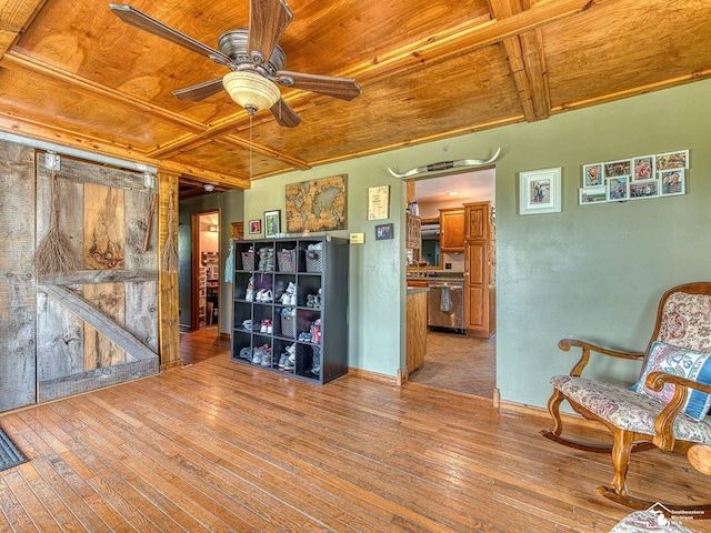 9601 Exeter Rd, Carleton, MI 48117 - sitting room featuring wooden ceiling, a ceiling fan, hardwood / wood-style flooring, and baseboards