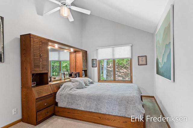 17879 Hidden Dunes Ln Unit D, Spring Lake, MI 49456 - bedroom with light colored carpet, baseboards, high vaulted ceiling, and a ceiling fan