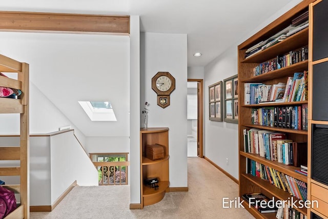 17879 Hidden Dunes Ln Unit D, Spring Lake, MI 49456 - interior space with a skylight, carpet floors, baseboards, and recessed lighting