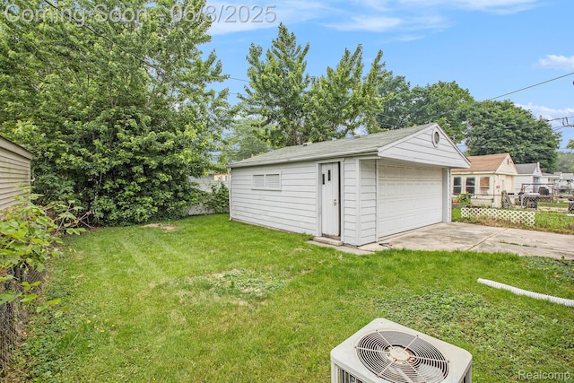 7612 Clippert St, Taylor, MI 48180 - view of yard featuring an outbuilding, a garage, and central air condition unit