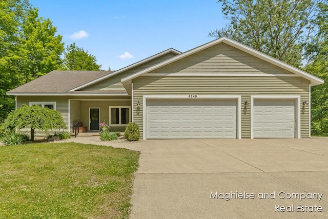 4349 Walter Rd, Wayland, MI 49348 - view of front facade featuring concrete driveway, a garage, and a front yard