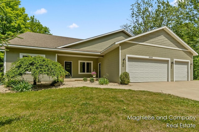 4349 Walter Rd, Wayland, MI 49348 - view of front of property featuring a garage, driveway, and a front yard
