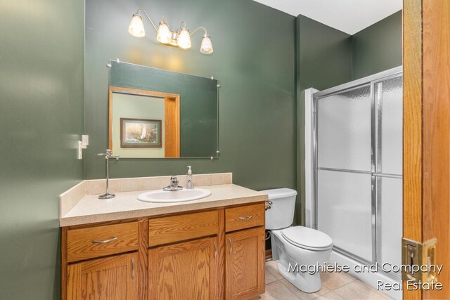 4349 Walter Rd, Wayland, MI 49348 - full bath with vanity, a stall shower, and tile patterned flooring