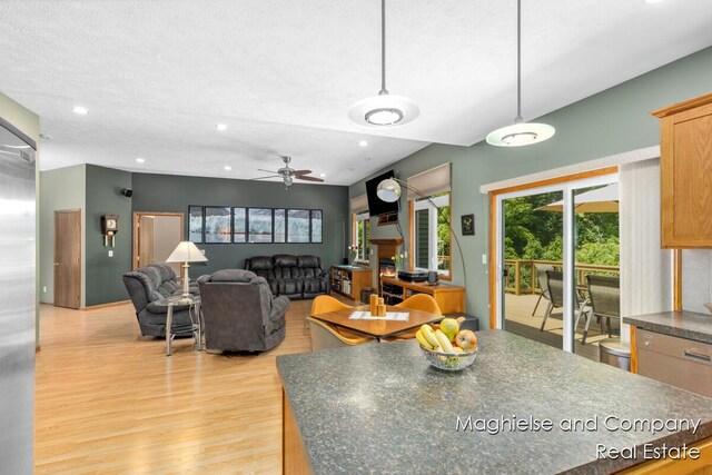 4349 Walter Rd, Wayland, MI 49348 - living room with light wood finished floors, a ceiling fan, and recessed lighting
