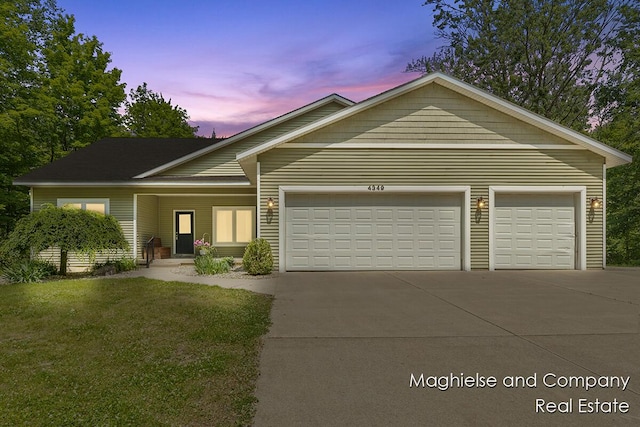 4349 Walter Rd, Wayland, MI 49348 - view of front of house featuring concrete driveway, an attached garage, and a front yard