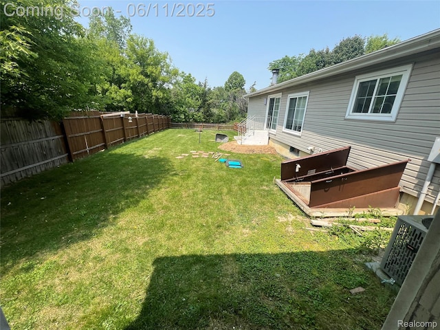 5550 Howe Rd, Grand Blanc, MI 48439 - view of yard with central AC unit