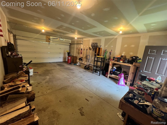 5550 Howe Rd, Grand Blanc, MI 48439 - garage featuring a garage door opener