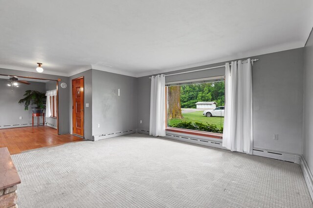 5244 Sand Creek Highway, Adrian, MI 49221 - empty room featuring carpet, baseboards, and a ceiling fan