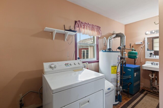 5244 Sand Creek Highway, Adrian, MI 49221 - laundry area featuring washer / clothes dryer, gas water heater, brick patterned flooring, and a heating unit