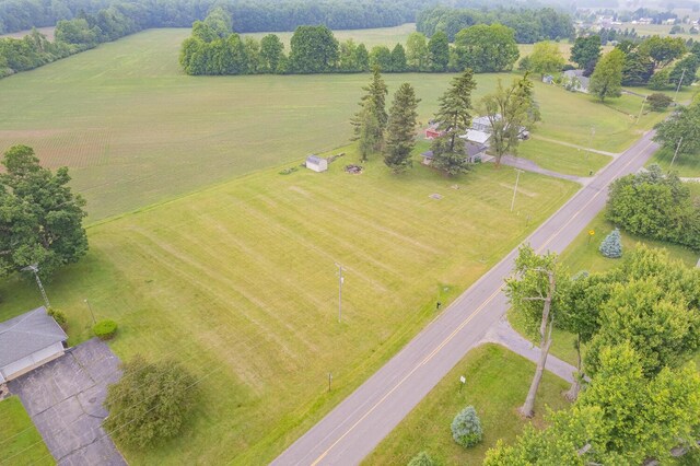 5244 Sand Creek Highway, Adrian, MI 49221 - aerial view of sparsely populated area featuring a pastoral area and rows of crops