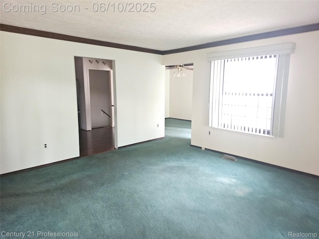 40859 Newport Dr, Plymouth, MI 48170 - carpeted spare room featuring baseboards, crown molding, and a textured ceiling