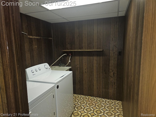 40859 Newport Dr, Plymouth, MI 48170 - washroom with separate washer and dryer and wood walls