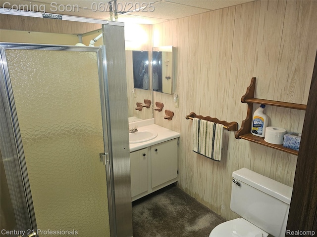 40859 Newport Dr, Plymouth, MI 48170 - full bathroom with vanity, toilet, a stall shower, and wooden walls