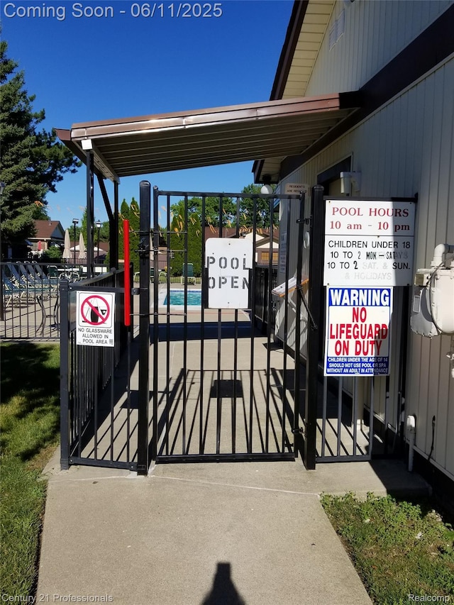 40859 Newport Dr, Plymouth, MI 48170 - view of property's community featuring a gate