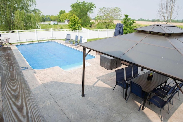 13952 Stowell Rd, Dundee, MI 48131 - view of pool featuring a patio area and a fenced backyard