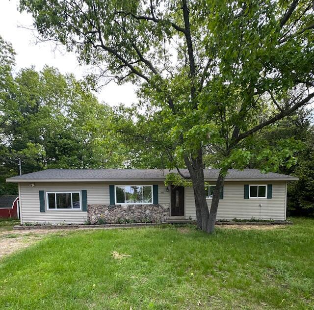 5511 Sunset Ct, Oscoda, MI 48750 - single story home featuring a front yard