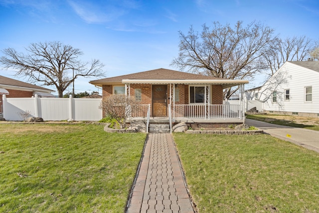 7369 Helen, Center Line, MI 48015 - view of front of home with a porch, brick siding, and a shingled roof