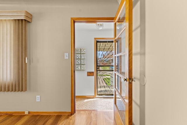 7369 Helen, Center Line, MI 48015 - hallway with baseboards, light wood-type flooring, and french doors