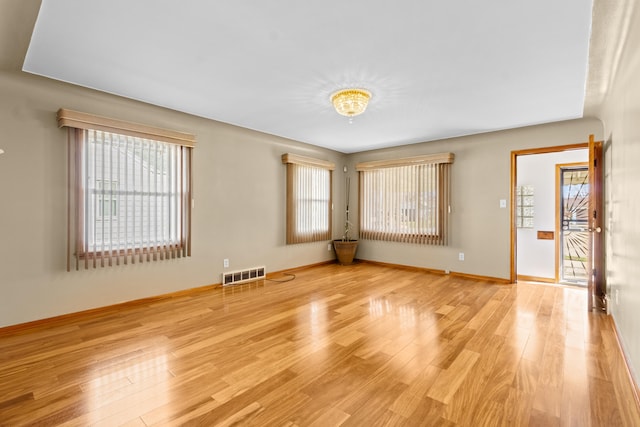 7369 Helen, Center Line, MI 48015 - spare room with plenty of natural light, light wood-style flooring, and baseboards