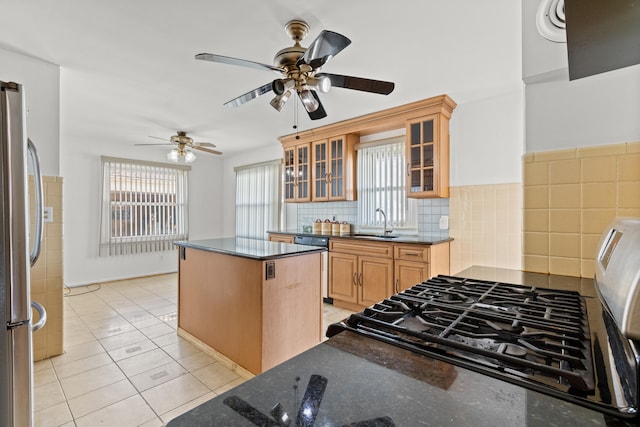 7369 Helen, Center Line, MI 48015 - kitchen with freestanding refrigerator, a ceiling fan, a sink, a center island, and light tile patterned floors