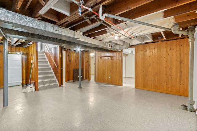 7369 Helen, Center Line, MI 48015 - basement featuring tile patterned floors, wood walls, and stairway