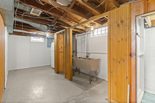 7369 Helen, Center Line, MI 48015 - basement with a sink, freestanding refrigerator, plenty of natural light, and electric panel