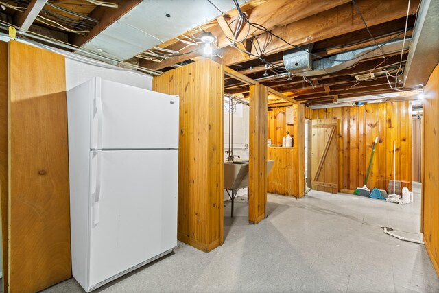 7369 Helen, Center Line, MI 48015 - unfinished basement featuring freestanding refrigerator and wood walls