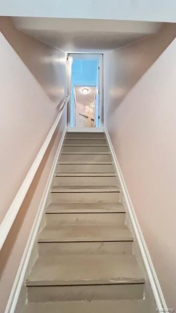 43573 E Perignon Dr N, Sterling Heights, MI 48314 - stairs featuring wood finished floors