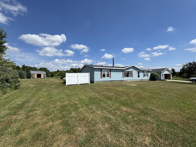 3828 90th Ave, Evart, MI 49631 - back of property featuring an outbuilding
