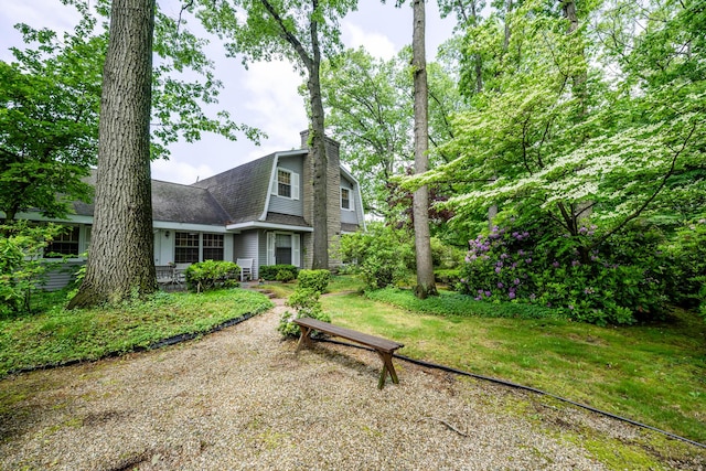 2900 Boyer Rd, Coloma, MI 49038 - view of front facade with a chimney, roof with shingles, and a front yard