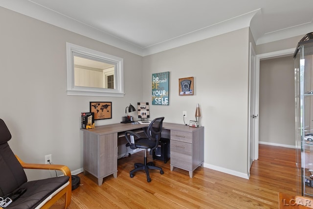 603 Outer Dr, Tecumseh, MI 49286 - office area featuring light wood-style flooring and baseboards