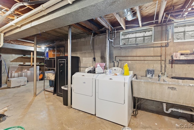 603 Outer Dr, Tecumseh, MI 49286 - unfinished below grade area with independent washer and dryer and a sink